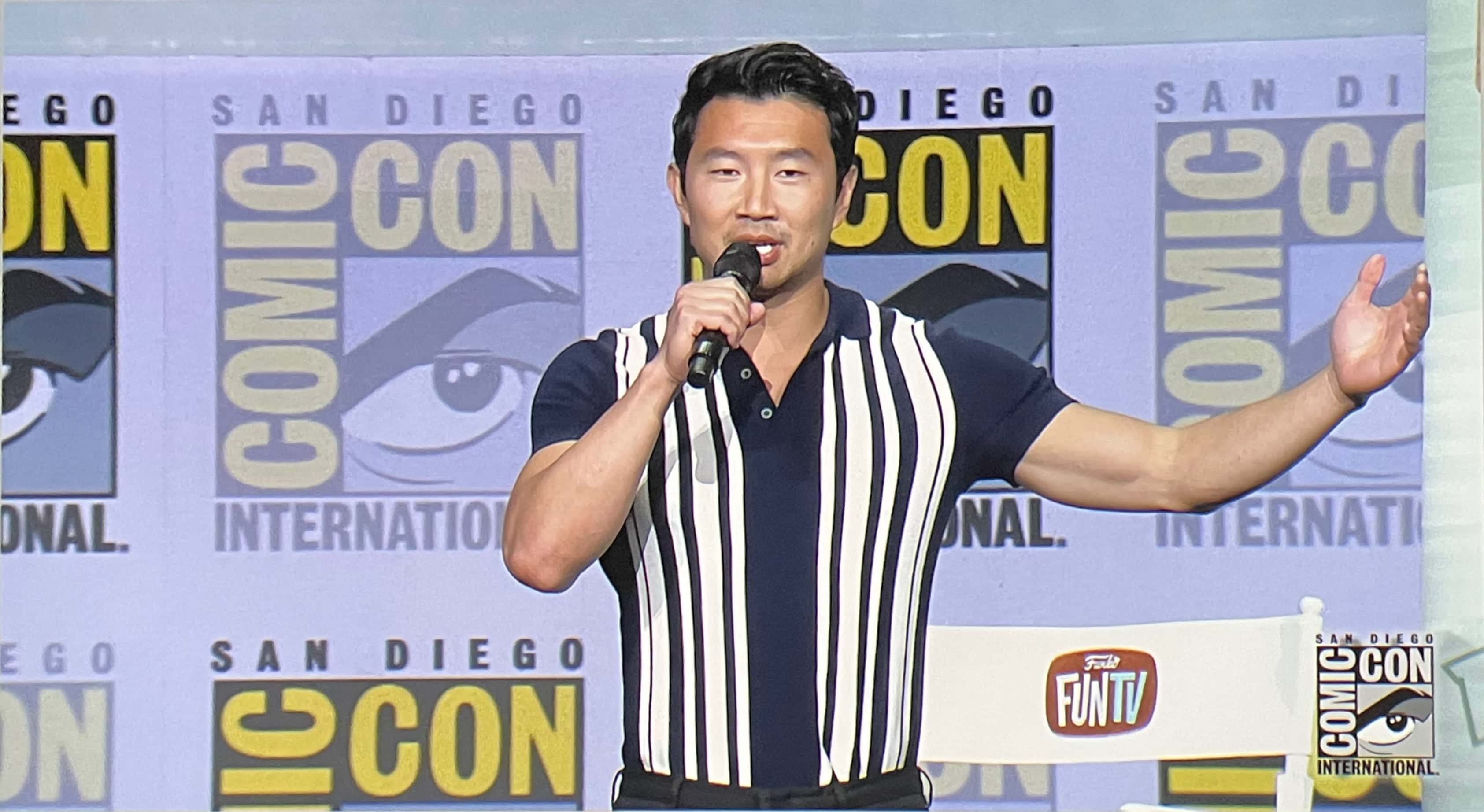 Simu Liu promoting his Shang-Chi Funko Pop figure