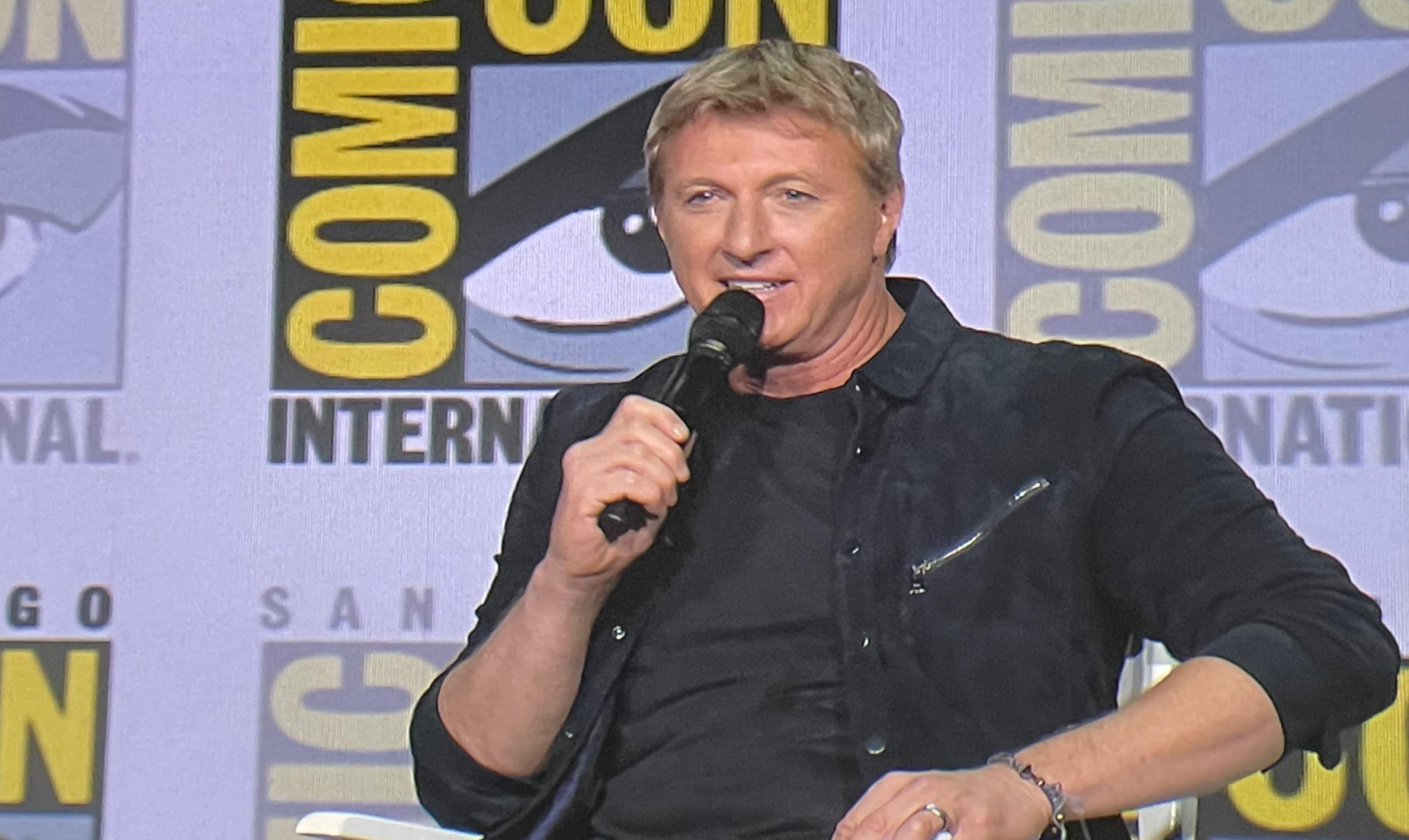 William Zabka promoting his Cobra Kai Funko Pop figure